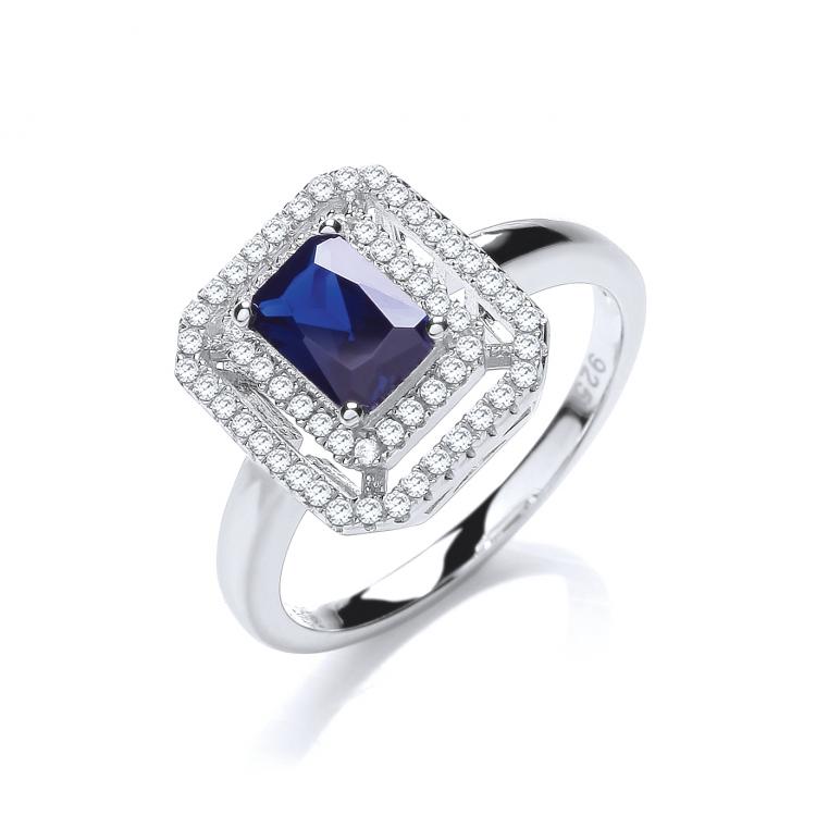 SWAN Boutique Rhodium Plated Silver Emerald Cut Blue Sapphire Halo Ring